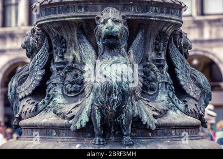 Detail of the architecture of the Saint Mark`s Square in Venice, Italy. The winged lion is a symbol of Venice. Stock Photo